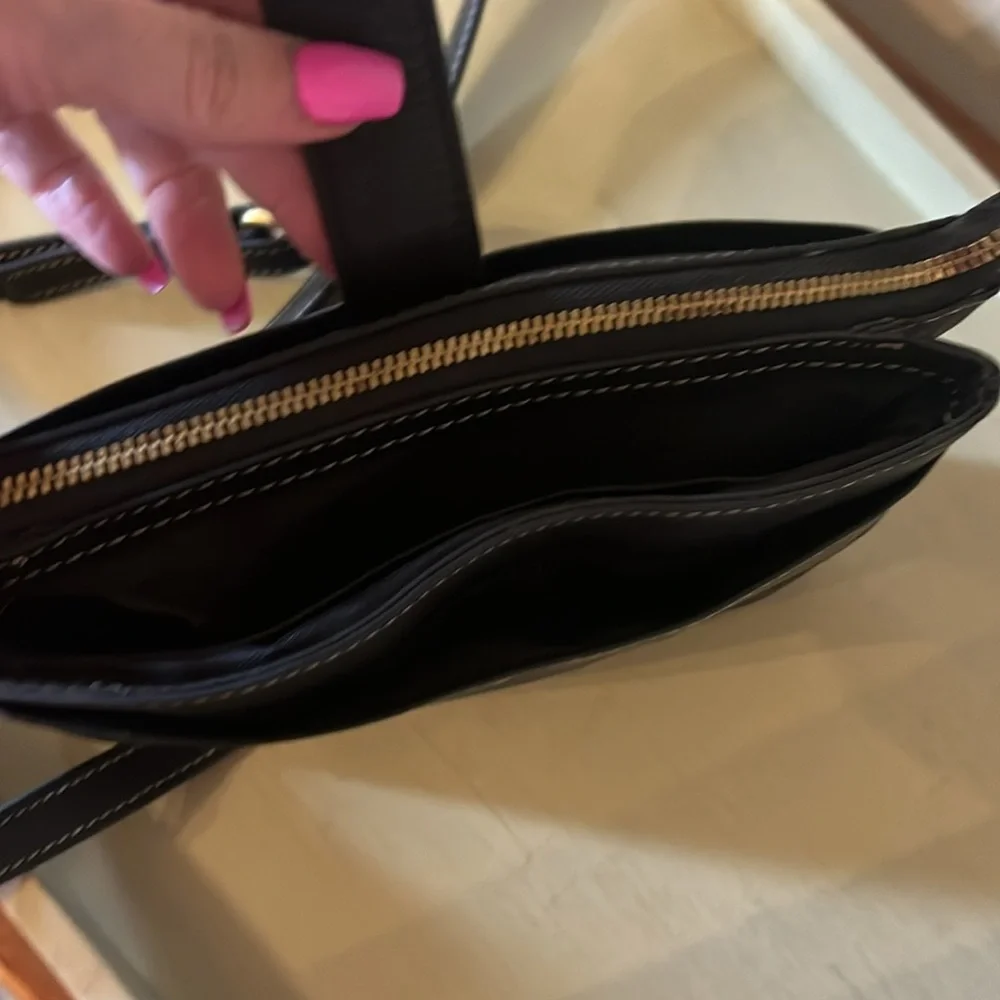 Lucky brand black leather Crossbody. Small purse. Excellent condition.